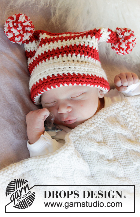 Tiny Elf / DROPS Baby 33-5 - Gehäkelte Mütze für Babys in DROPS Merino Extra Fine. Die Arbeit wird gehäkelt mit Streifen und Pompons. Größe Frühchen - 4 Jahre.