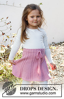 Do the Twist / DROPS Baby & Children 38-14 - Knitted skirt for kids in DROPS Merino Extra Fine. Piece is knitted top down with lace pattern. Size 2 - 12 years