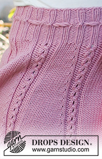 Do the Twist / DROPS Baby & Children 38-14 - Knitted skirt for kids in DROPS Merino Extra Fine. Piece is knitted top down with lace pattern. Size 2 - 12 years
