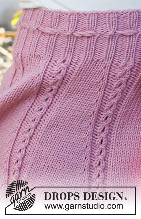 Do the Twist / DROPS Baby & Children 38-14 - Knitted skirt for kids in DROPS Merino Extra Fine. Piece is knitted top down with lace pattern. Size 2 - 12 years