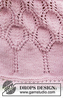 Little Miss Daisy / DROPS Baby & Children 38-2 - Prjónaður kjóll fyrir börn úr DROPS Cotton Merino. Stykkið er prjónað með laskalínu, ofan frá og niður með gatamynstri. Stærð 0 – 4 ára.