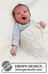 Whisper of White / DROPS Baby & Children 39-2 - Deka pro miminka pletená copánkovým vzorem z příze DROPS Alpaca a DROPS Kid-Silk. Motiv: Dětské deky.