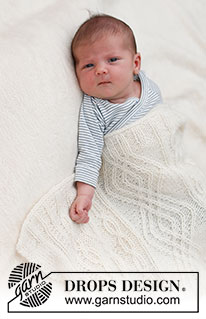 Whisper of White / DROPS Baby & Children 39-2 - Deka pro miminka pletená copánkovým vzorem z příze DROPS Alpaca a DROPS Kid-Silk. Motiv: Dětské deky.