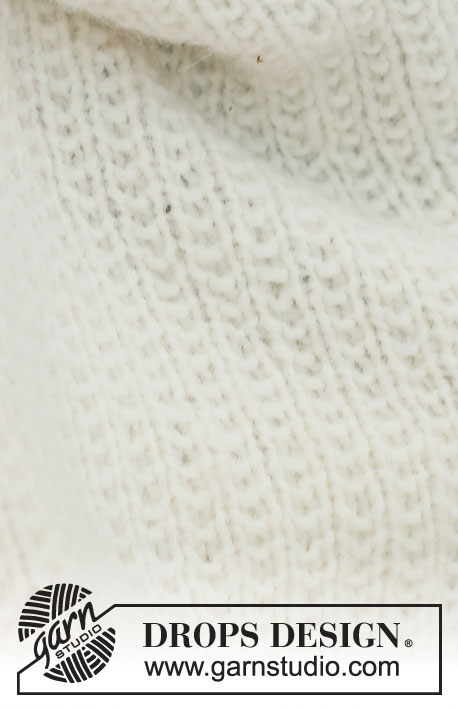 Stitches In Time / DROPS Baby & Children 39-3 - Gebreide deken voor baby in DROPS Air. Het werk wordt gebreid met structuurpatroon. Thema: babydeken
