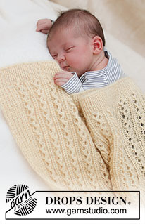 Honey Honey / DROPS Baby & Children 39-4 - Vauvan neulottu peitto DROPS BabyMerino- ja DROPS Kid-Silk -langoista. Työssä on pitsineuletta. Teema: Vauvanpeitto