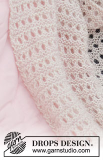 Sweet Baby Blossom / DROPS Baby & Children 39-5 - Couverture tricotée pour bébé au point ajouré, en DROPS BabyMerino et DROPS Kid-Silk. Thème: Couverture bébé
