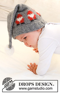 Merry Santas Hat / DROPS Baby 42-22 - Knitted hat for baby in DROPS Air. The piece is worked with Santas and a pom pom. Sizes 0 - 2 years. Theme: Christmas.