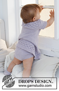 Bellflower Dress / DROPS Baby 43-11 - Gestricktes Kleid für Babys und Kinder in DROPS Alpaca. Die Arbeit wird von oben nach unten mit Rundpasse und Lochmuster gestrickt. Größe 0 - 4 Jahre.