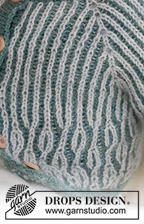 Harbour Highlights Cardigan / DROPS Baby 43-18 - Cardigan lavorato ai ferri per neonati e bambini in DROPS Alpaca. Lavorato dall’alto in basso con raglan e coste inglesi a 2 colori. Taglie: 0 – 4 anni.