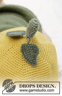 Sweet Lemon Hat / DROPS Baby 45-12 - Hæklet citron hue til baby i DROPS BabyMerino. Arbejdet hækles oppefra og ned som en citron med stilk og blade. Størrelse 0 - 4 år.