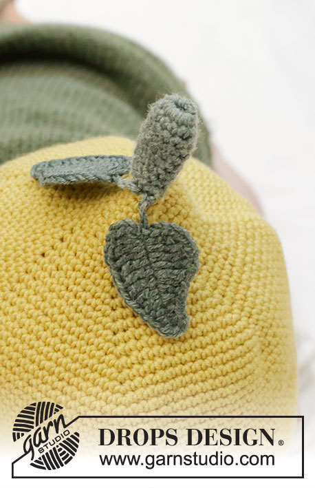 Sweet Lemon Hat / DROPS Baby 45-12 - Hæklet citron hue til baby i DROPS BabyMerino. Arbejdet hækles oppefra og ned som en citron med stilk og blade. Størrelse 0 - 4 år.