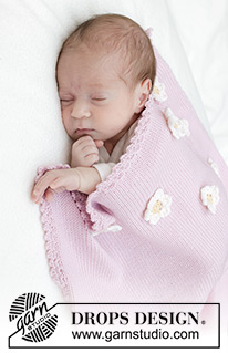 Little Daisy Blanket / DROPS Baby 46-1 - Dziecięcy kocyk na drutach, z włóczki DROPS BabyMerino. Przerabiany dżersejem z brzegiem i kwiatami na szydełku. Temat: kocyk dziecięcy.