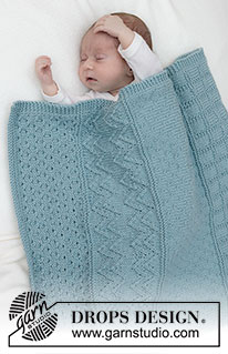 Dot Dot Line Blanket / DROPS Baby 46-3 - Knitted baby blanket in DROPS Merino Extra Fine. The piece is worked back and forth with relief-pattern.