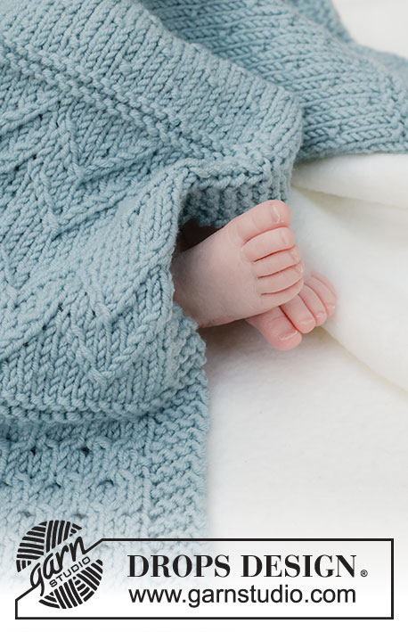 Dot Dot Line Blanket / DROPS Baby 46-3 - Knitted baby blanket in DROPS Merino Extra Fine. The piece is worked back and forth with relief-pattern.
