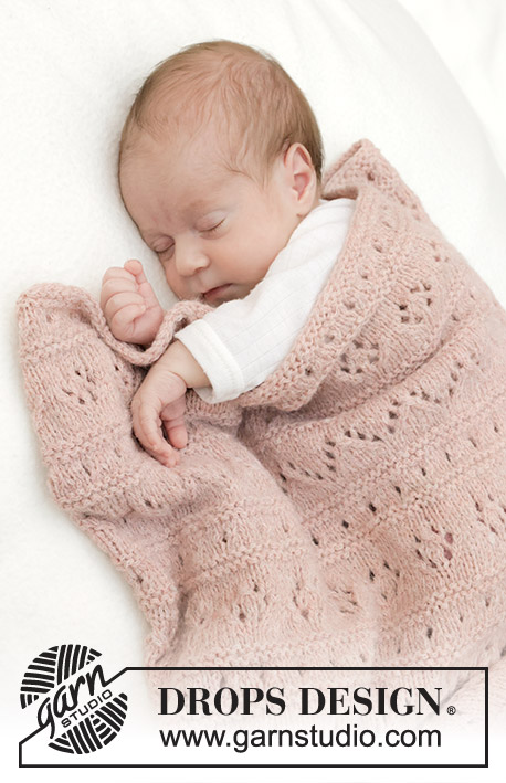 Pink Sea Blanket / DROPS Baby 46-9 - Strikket teppe til baby i DROPS Sky. Arbeidet strikkes med hullmønster og riller.
