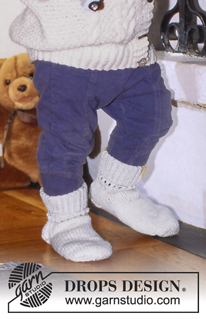 DROPS Baby 5-10 - Cardigan and socks in Karisma or Cotton Merino with cables.