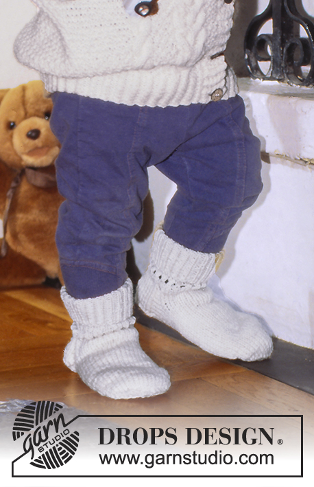 DROPS Baby 5-10 - Cardigan and socks in Karisma or Cotton Merino with cables.