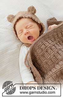 Cocoa Dream Bonnet / DROPS Baby 51-1 - Gestrickte Haube / Mütze für Babys und Kinder in DROPS Alpaca. Die Arbeit wird kraus rechts mit Ohren, Abkettrand mit Picots und I-Cord gestrickt. Größe Frühchen – 4 Jahre.