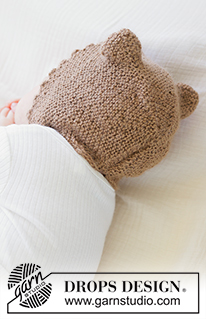 Cocoa Dream Bonnet / DROPS Baby 51-1 - Gestrickte Haube / Mütze für Babys und Kinder in DROPS Alpaca. Die Arbeit wird kraus rechts mit Ohren, Abkettrand mit Picots und I-Cord gestrickt. Größe Frühchen – 4 Jahre.