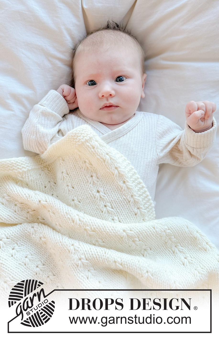 Snuggle Mist Blanket / DROPS Baby 51-8 - Kötött takaró babáknak, DROPS Merino Extra Fine fonalból. A darabot oda-vissza haladva készítjük, lustakötéssel és csipkemintával.