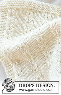 Snuggle Mist Blanket / DROPS Baby 51-8 - Kötött takaró babáknak, DROPS Merino Extra Fine fonalból. A darabot oda-vissza haladva készítjük, lustakötéssel és csipkemintával.