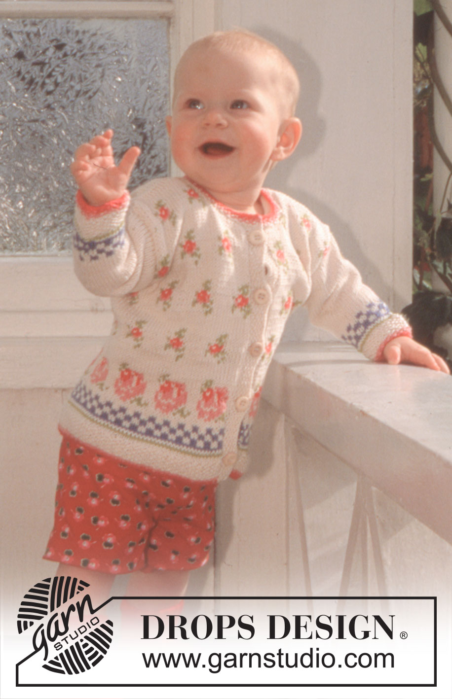 DROPS Baby 6-22 - Cardigan and socks in Safran with roses