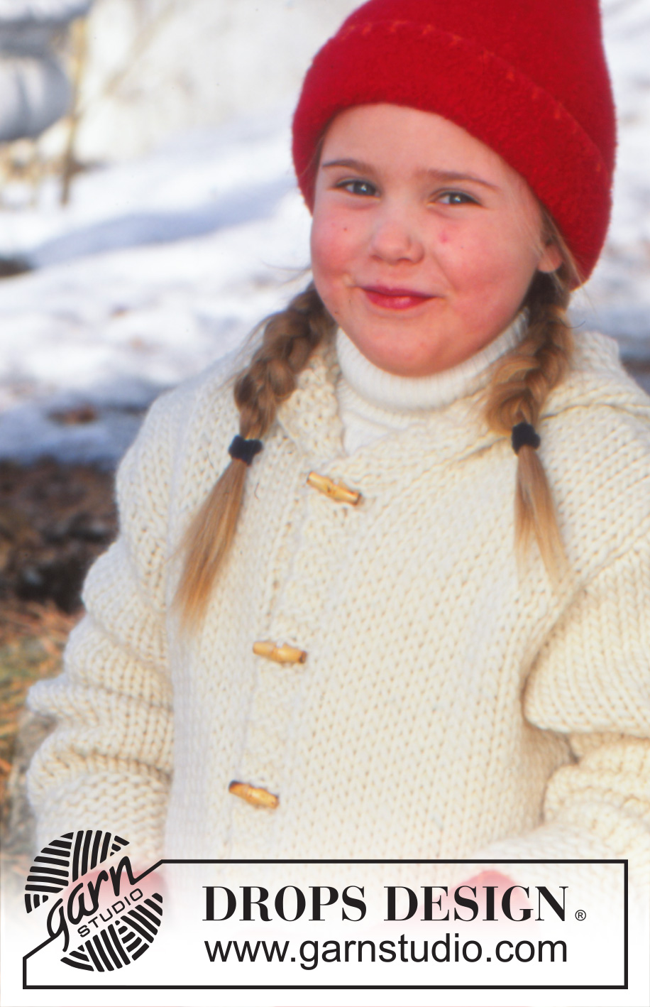 Elf Warmers / DROPS Children 12-23 - Strikket jakke til barn i DROPS Snow. Arbeidet strikkes med hette og lommer med riller og dusker. Størrelse 3 - 14 år.