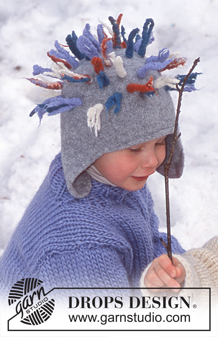DROPS Children 12-47 - Hat with plaits or spiky tassels