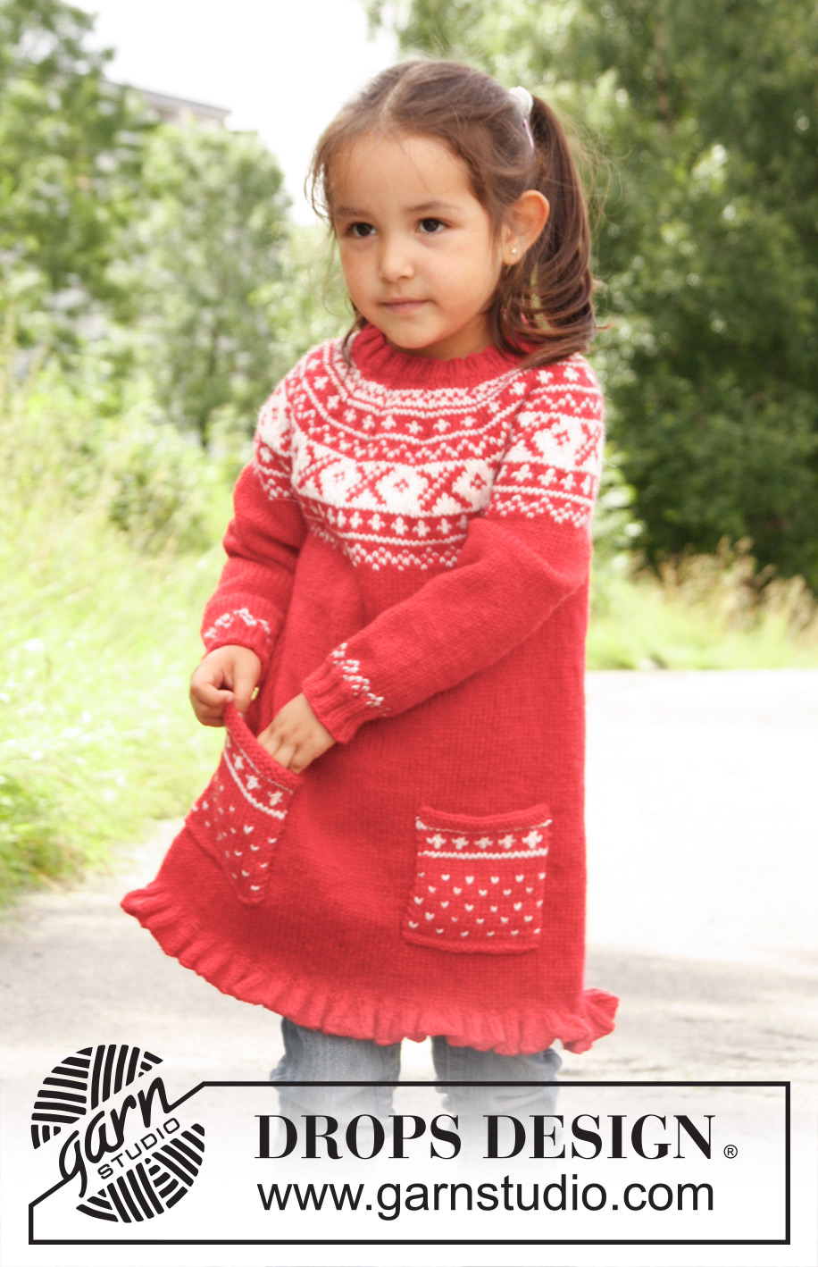 Selina / DROPS Children 22-20 - Knitted DROPS tunic worked top down in ”Karisma” with round yoke and Norwegian pattern. 
Size 3 - 12 years.
