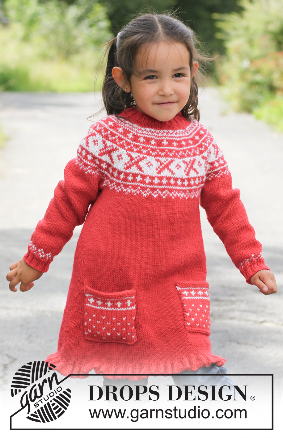 Selina / DROPS Children 22-20 - Knitted DROPS tunic worked top down in ”Karisma” with round yoke and Norwegian pattern. 
Size 3 - 12 years.
