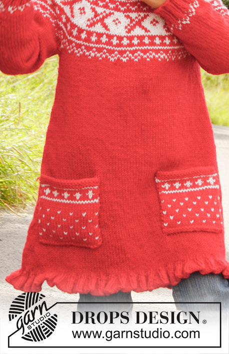 Selina / DROPS Children 22-20 - Knitted DROPS tunic worked top down in ”Karisma” with round yoke and Norwegian pattern. 
Size 3 - 12 years.
