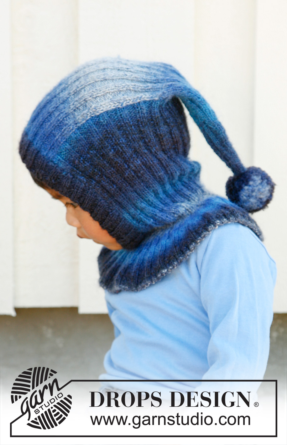 Winter Jolly / DROPS Children 22-38 - DROPS Mütze / Schalmütze / Balaclava mit Pompom in ”Delight”. Grösse 3 bis 12 Jahre.