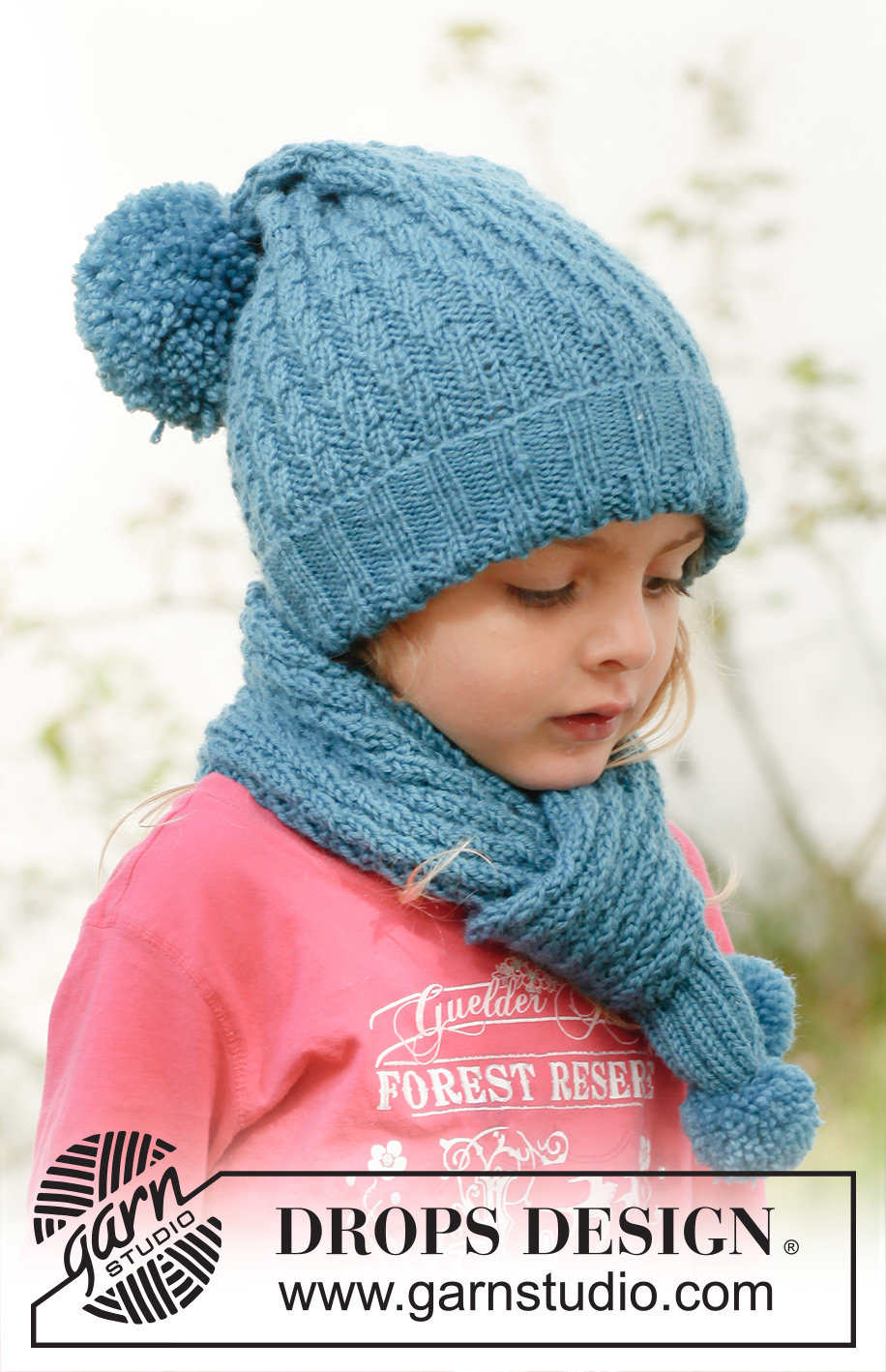 Sea dream / DROPS Children 23-5 - Gebreide muts met pompon in sjaal met diagonale boordsteek patroon in 
DROPS Merino Extra Fine. Maat kinderen 3 tot 12 jaar.
