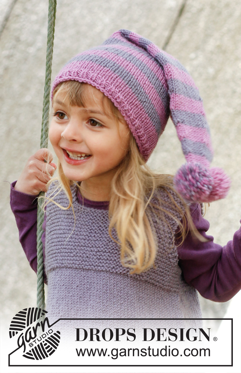 Tuva / DROPS Children 23-6 - Knitted children's hat with stripes and pompom in DROPS Karisma.