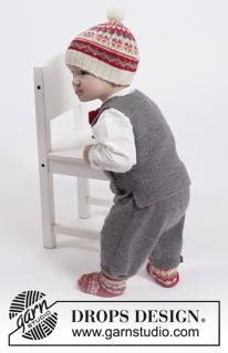 Goofy Gavin / DROPS Children 26-15 - Set of knitted vest with pockets and v-neck and short pants in stockinette st in DROPS BabyMerino, plus knitted hat and socks with Nordic pattern and bow in garter st in DROPS Fabel. For baby and children in size 1 month - 6 years.