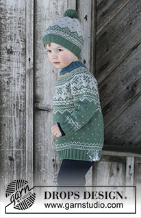 Seiland Jumper / DROPS Children 30-5 - Conjunto que consiste de: Pulóver para niños con canesú redondo y patrón de jacquard nórdico, tejido de arriba para abajo. Gorro con patrón de jacquard nórdico y pompón. Talla 2 – 12 años. El conjunto es tejido en DROPS Merino Extra Fine.