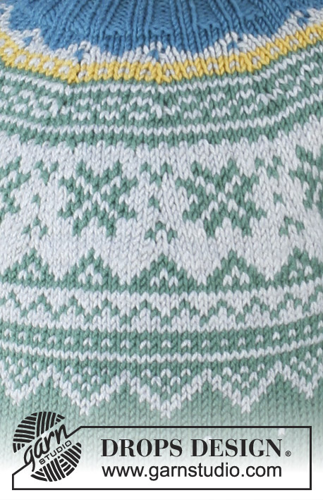 Seiland Jumper / DROPS Children 30-5 - Conjunto que consiste de: Pulóver para niños con canesú redondo y patrón de jacquard nórdico, tejido de arriba para abajo. Gorro con patrón de jacquard nórdico y pompón. Talla 2 – 12 años. El conjunto es tejido en DROPS Merino Extra Fine.