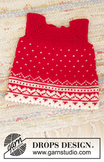Christmas Cora / DROPS Children 35-15 - Strikket kjole til dukke i DROPS BabyMerino. Arbeidet er strikket ovenfra og ned med raglan, nordisk mønster og riller.
