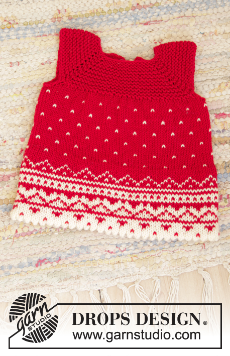 Christmas Cora / DROPS Children 35-15 - Strikket kjole til dukke i DROPS BabyMerino. Arbeidet er strikket ovenfra og ned med raglan, nordisk mønster og riller.