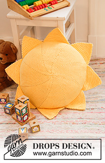 Sunny Nap Pillow / DROPS Children 35-3 - Slunce - povlak na kruhový polštář pletený z příze DROPS Paris.