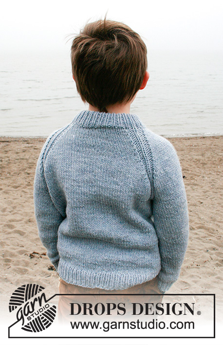 Strand Jumper / DROPS Children 40-3 - Sweter dziecięcy na drutach, przerabiany od góry do dołu, z podwójnym wykończeniem dekoltu i reglanowymi rękawami, z włóczki DROPS Alaska. Od 2 do 12 lat.