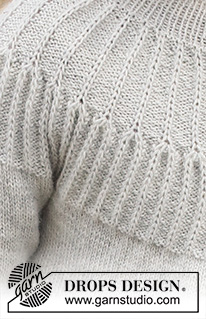 Hermine / DROPS Children 41-14 - Strikket bluse til børn i DROPS Alpaca. Arbejdet strikkes oppefra og ned med rundt bærestykke, strukturmønster og patentmasker på bærestykket. Størrelse 2 til 12 år.