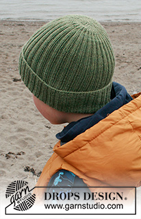 Winter Fun / DROPS Children 41-27 - Dětská čepice s ohrnutým lemem pletená pružným vzorem z příze DROPS BabyMerino. Velikost 2 až 12 let.