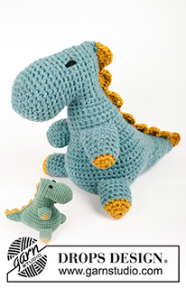 Dino Cuddles / DROPS Children 41-29 - Virkad dinosaurie tyrannosaurus rex (T-Rex) i 2 trådar DROPS Snow. Arbetet virkas från nos till svans med bara en söm. Tema: gosedjur.