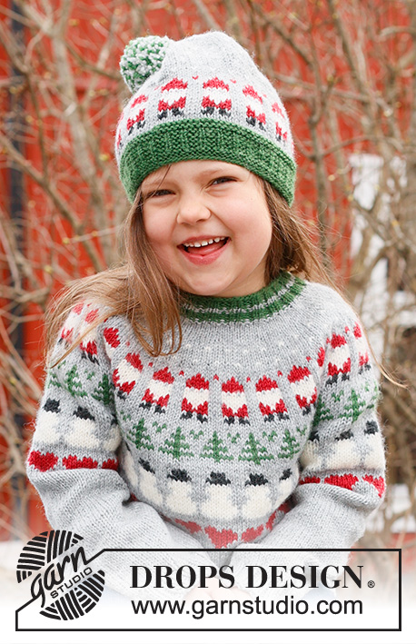 Christmas Time Sweater / DROPS Children 44-14 - Stickad tröja till barn i DROPS Karisma. Arbetet stickas uppifrån och ner med runt ok och flerfärgat mönster med tomte, gran och hjärta. Storlek 2 – 14 år. Tema: Jul.