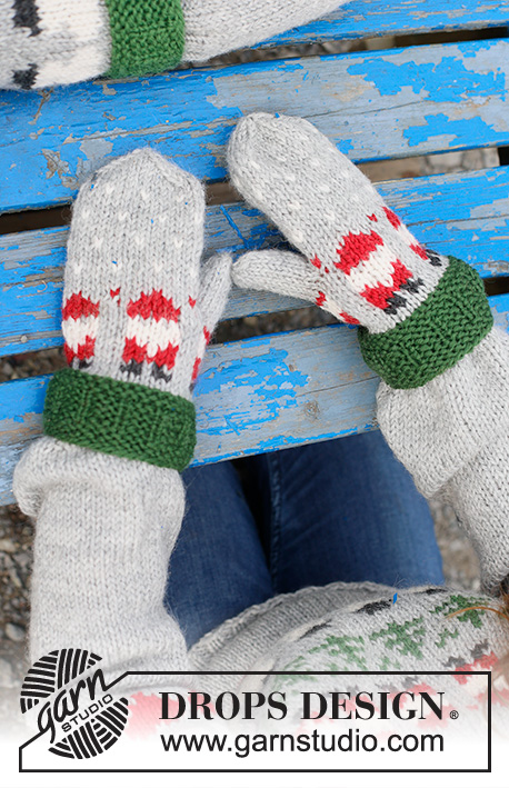 Santa Time Mittens / DROPS Children 44-16 - Rękawiczki dziecięce na drutach, z włóczki DROPS Karisma. Przerabiane od dołu do góry, z żakardem w Mikołaje. Od 2 do 14 lat. Temat: Boże Narodzenie.