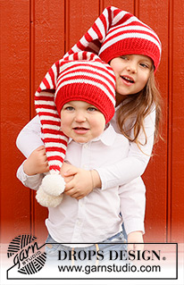 Santa's Helpers / DROPS Children 44-23 - Gehäkelte Weihnachtsmütze / lange Mütze / Zipfelmütze für Kinder in DROPS BabyMerino. Die Arbeit wird von unten nach oben in Streifen gehäkelt. Thema: Weihnachten.