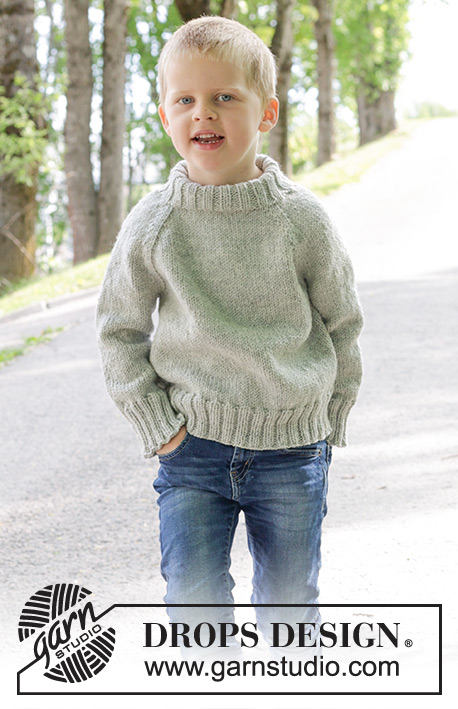 Sea Salt / DROPS Children 47-10 - Gebreide trui voor kinderen in DROPS Alaska. Het werk wordt van boven naar beneden gebreid met raglan en dubbele halsrand. Maten 2 – 12 jaar.