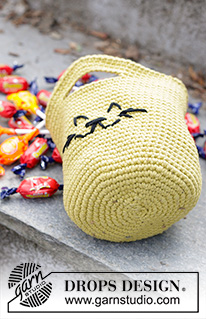 Cat Tricks Bag / DROPS Children 47-31 - Hæklet kurv / taske med kat i DROPS Paris. Arbejdet hækles rundt, nedefra og op. Tema: Halloween.