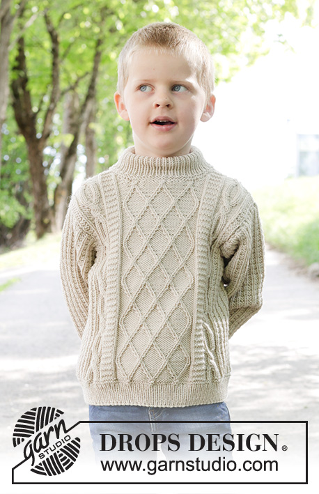 Ocean Ropes / DROPS Children 47-32 - Gebreide trui voor kinderen in DROPS Merino Extra Fine. Het werk wordt van onder naar boven gebreid met reliëfpatroon en kabels. Maten 2 tot 12 jaar.